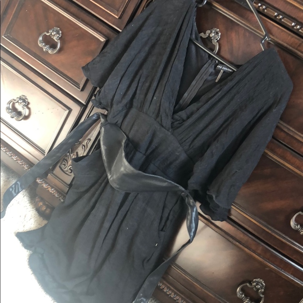 Black long top. With belt